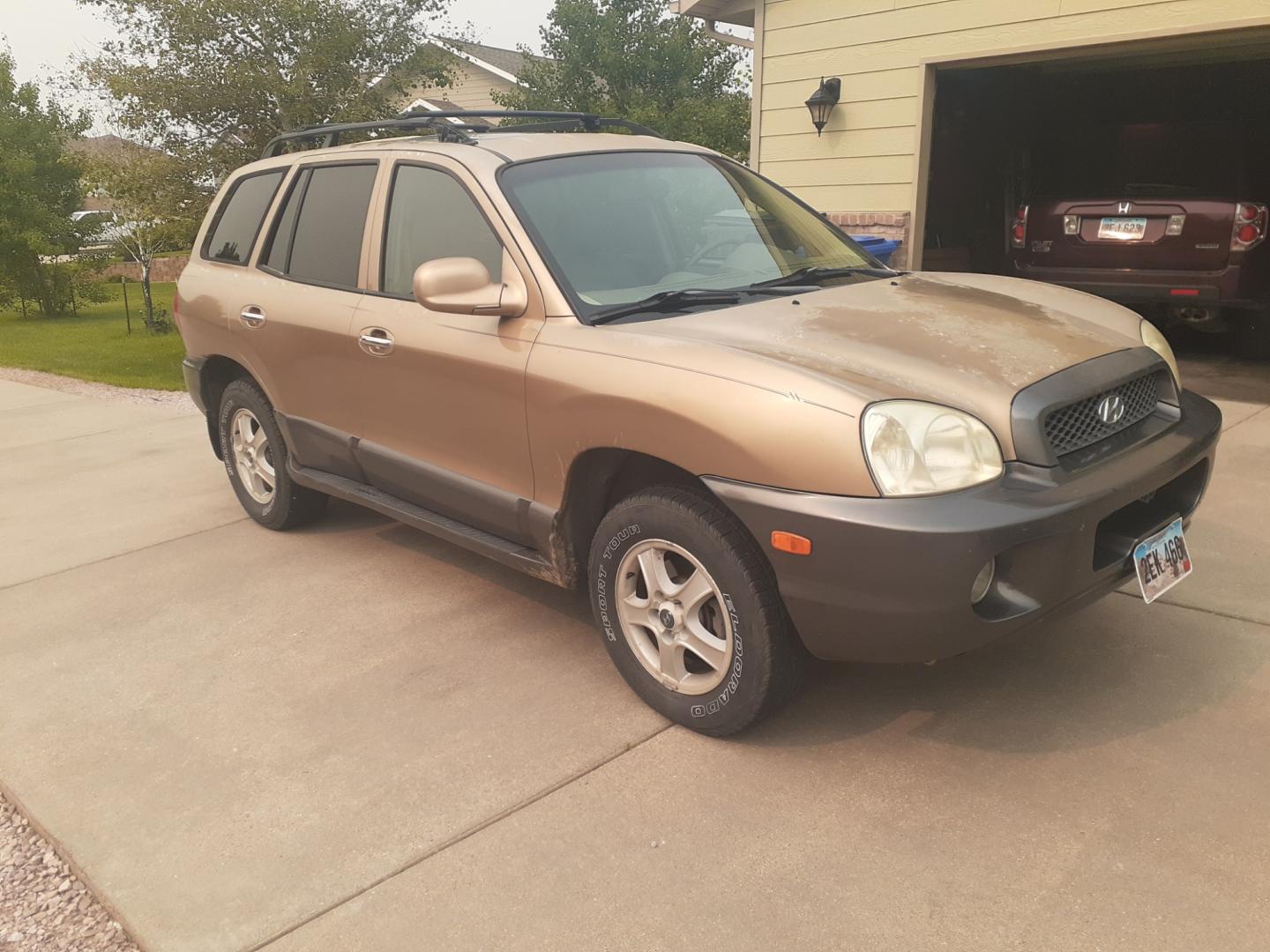 2003 Hyundai Santa Fe GLS (KM8SC73D93U) with an 2.7 V6 engine, Automatic transmission, located at 2015 Cambell Street, Rapid City, SD, 57701, (605) 342-8326, 44.066433, -103.191772 - CONSIGMENT VEHICLE CASH ONLY NO FINANCING CALL OR TEXT JEFF FOR MORE INFO 605-390-0478 - Photo#4